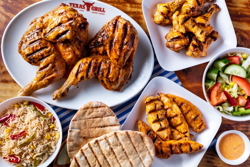 Grilled chicken spread with rice and salad