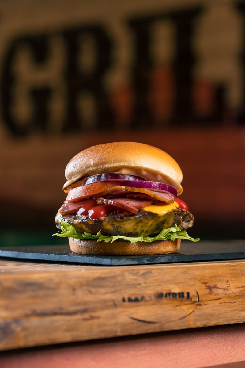 Gourmet burger with bacon and cheese