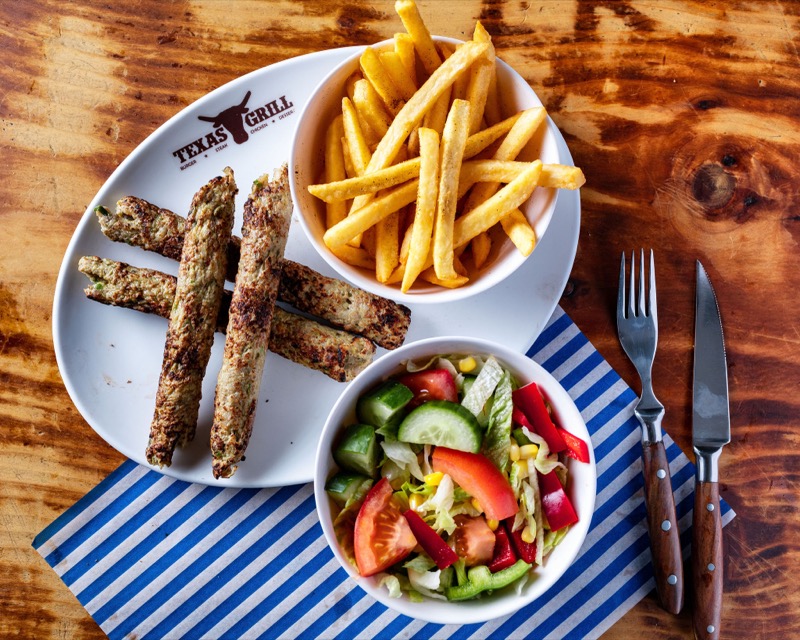 Seekh kebabs with fries and salad